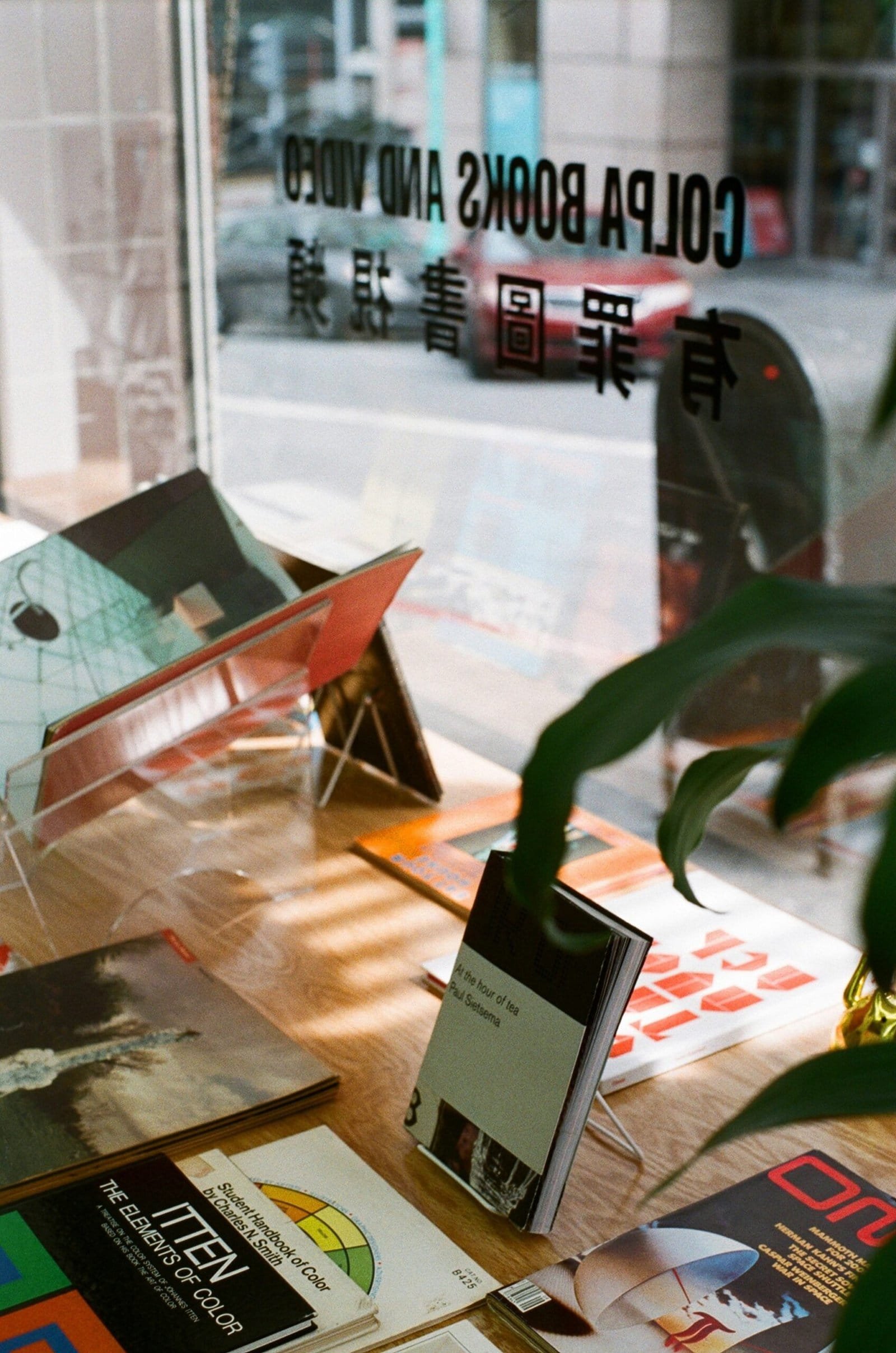 a stack of flyers on a table