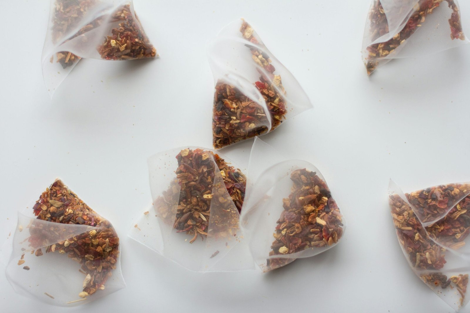 white and brown stones on white surface